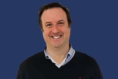 Head shot of Paul Ballam, Senior Vice President, Head of Real Estate & AGC Strategy at American Golf Corporation