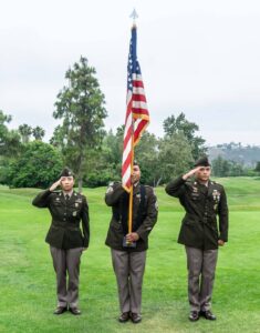 Soldiers salute the flag the 3rd annual Folds of Honor tournament