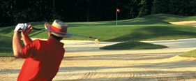 Golfer Teeing Off